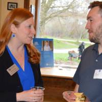 man and woman talk and smile